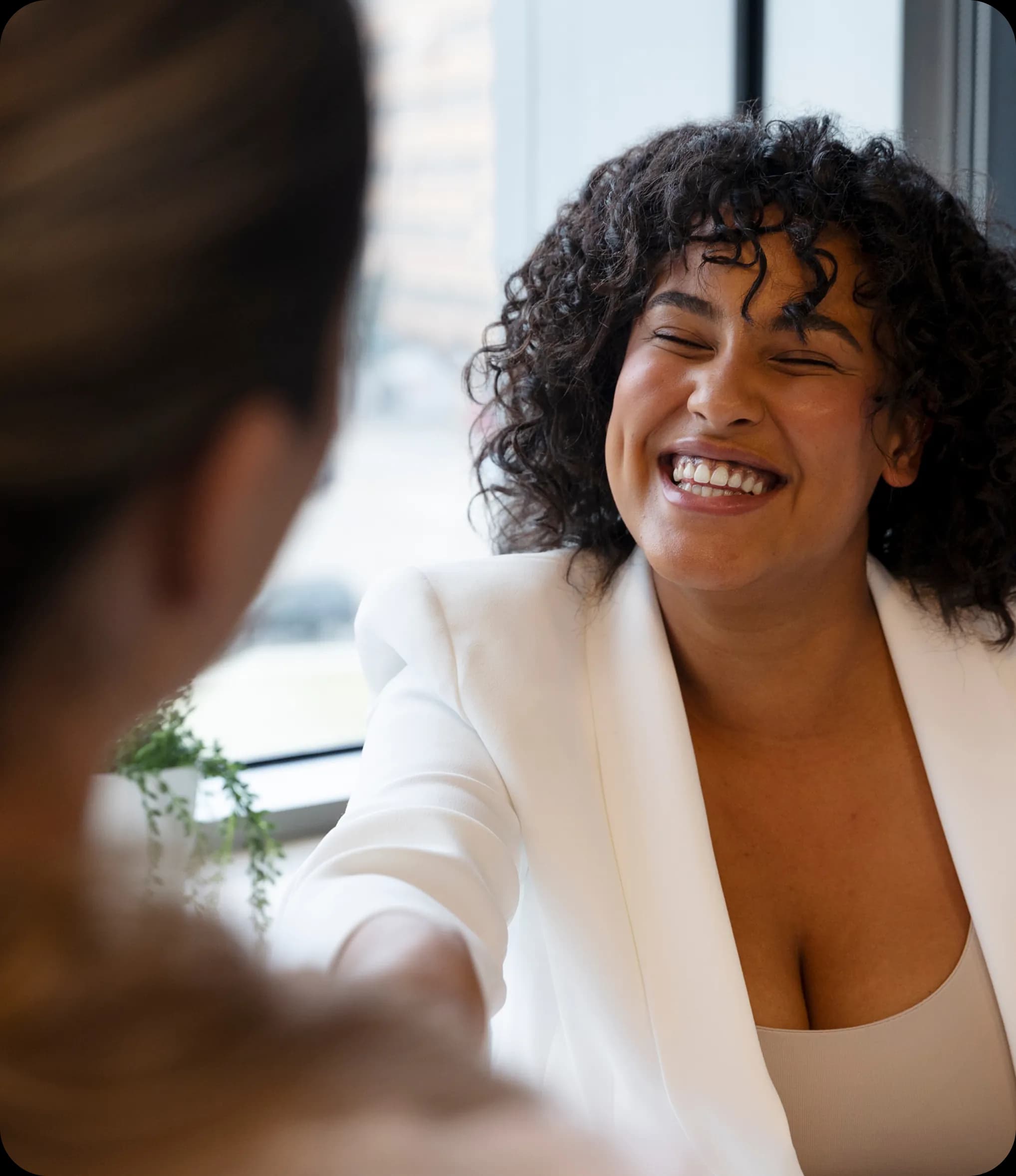 Therapist smiling with patient