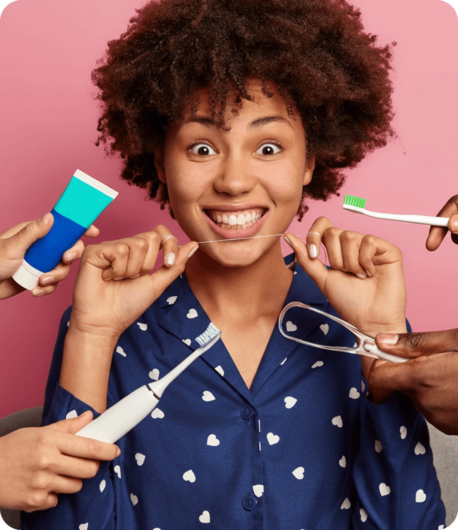 Smiling woman with dental care products